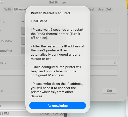The Printer Restart Required dialog listing the final steps after configuring the network